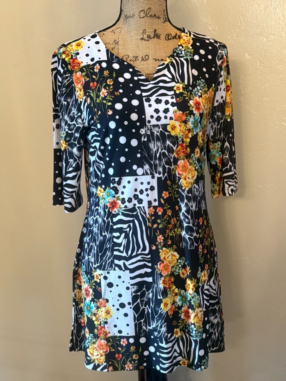Attitudes by Renee Mixed Print Tunic Top Small NWT
Floral Zebra Stretch Blouse